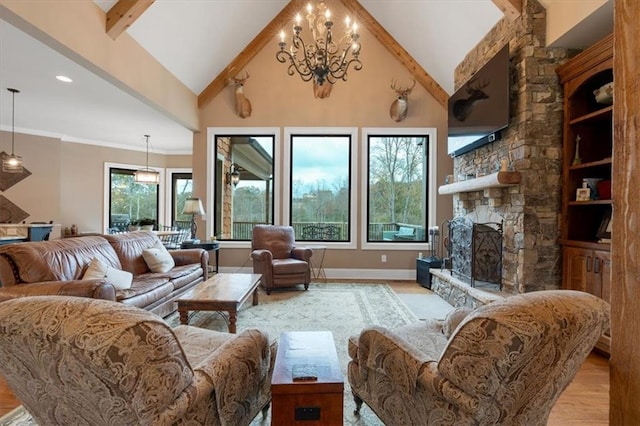 living room featuring a fireplace, light wood-type flooring, beam ceiling, high vaulted ceiling, and a chandelier