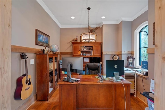 office featuring light wood-type flooring and crown molding