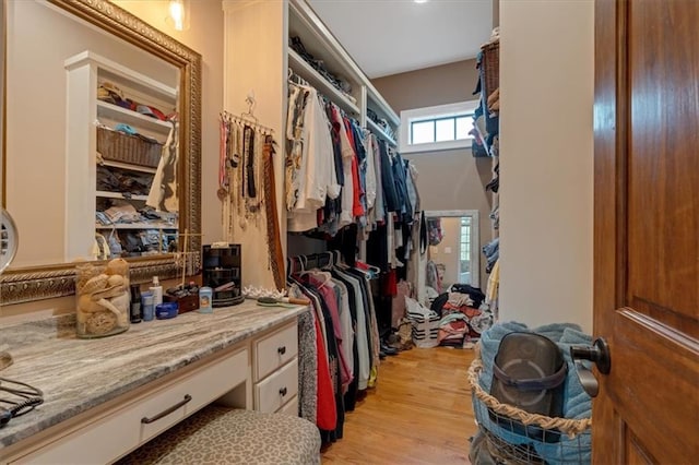 spacious closet featuring light wood-type flooring