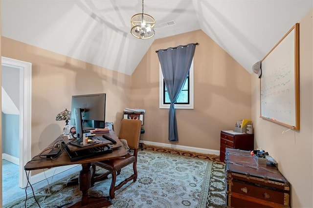 office with a chandelier and vaulted ceiling