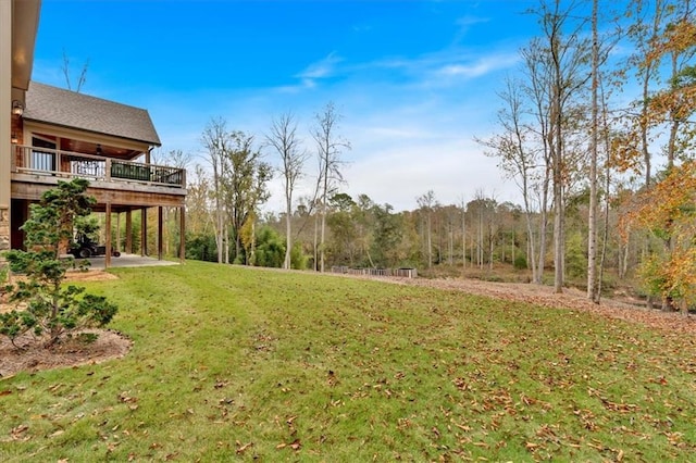 view of yard with a deck