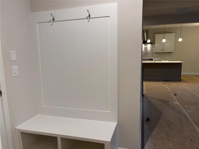 mudroom featuring a sink and visible vents