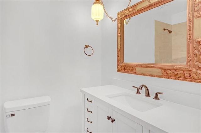 full bath with toilet, a shower, and vanity