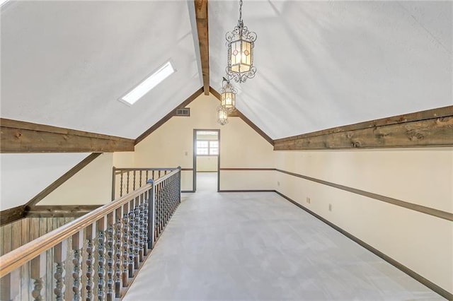 bonus room with vaulted ceiling with skylight, baseboards, carpet flooring, and visible vents
