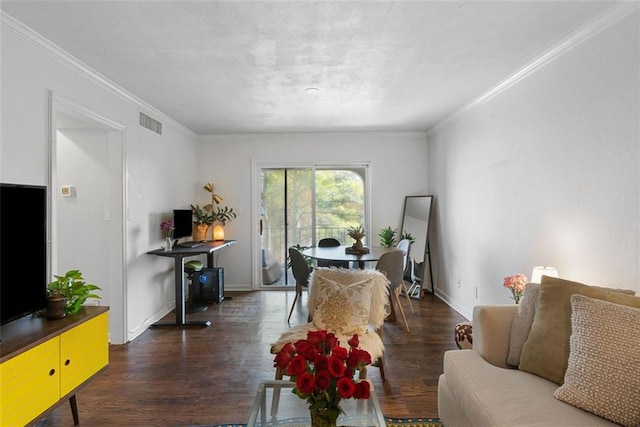 living room with crown molding and dark hardwood / wood-style floors