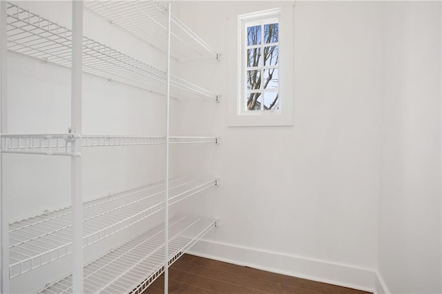 spacious closet with wood finished floors