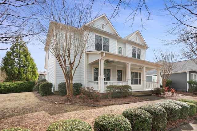 view of front facade featuring ceiling fan and covered porch