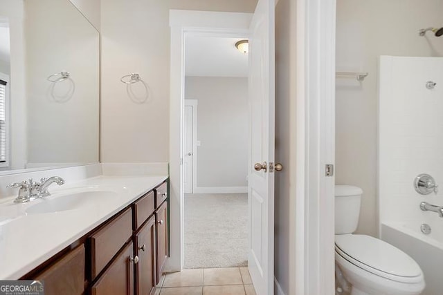 bathroom featuring vanity, tile patterned floors, toilet, and shower / bathing tub combination