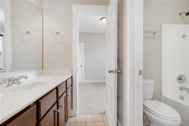 full bathroom featuring tile patterned flooring, tub / shower combination, toilet, and vanity