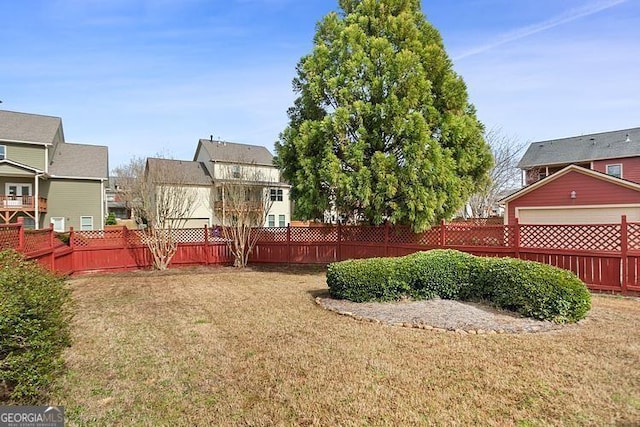 view of yard with fence