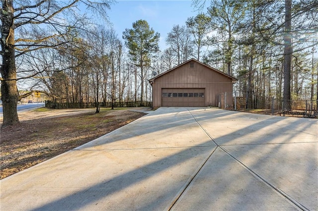 view of side of home with a garage