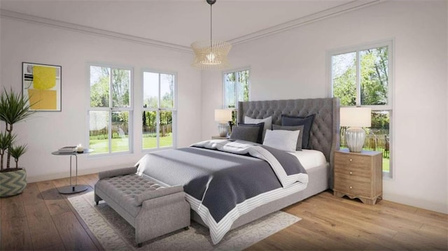 bedroom with hardwood / wood-style flooring and crown molding