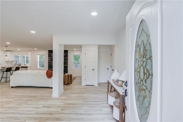 entrance foyer with light wood-type flooring and recessed lighting