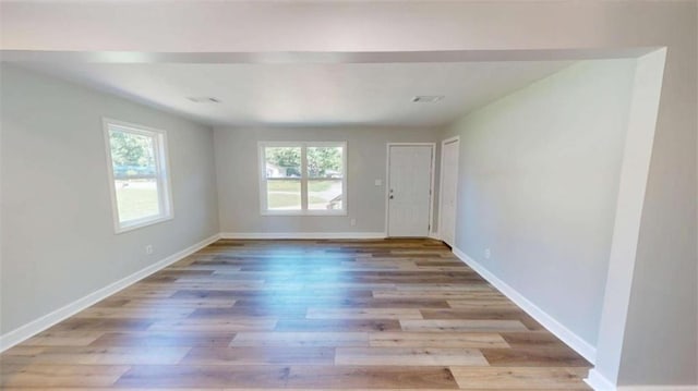 86 Martin Luther King Jr Dr, Jefferson, GA 30549 - empty room featuring wood finished floors and baseboards