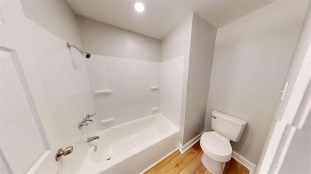 86 Martin Luther King Jr Dr, Jefferson, GA 30549 - full bathroom featuring toilet, wood finished floors, shower / washtub combination, and baseboards