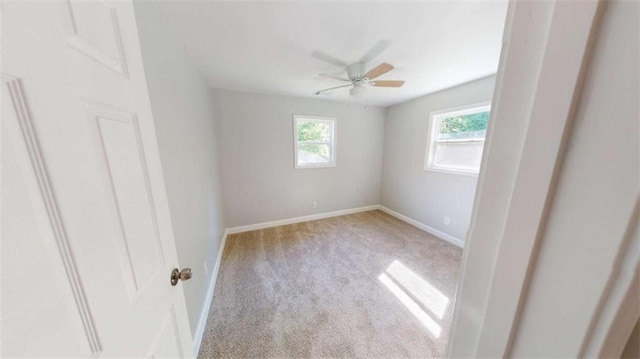 86 Martin Luther King Jr Dr, Jefferson, GA 30549 - spare room featuring carpet, a ceiling fan, and baseboards
