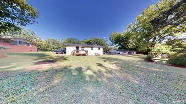 86 Martin Luther King Jr Dr, Jefferson, GA 30549 - view of green lawn with a wooden deck