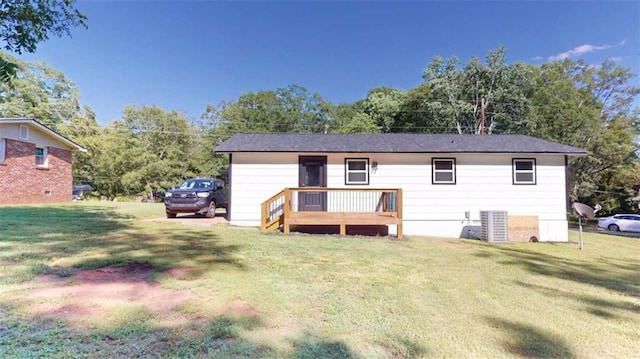 86 Martin Luther King Jr Dr, Jefferson, GA 30549 - rear view of property with a lawn, central AC unit, and a wooden deck