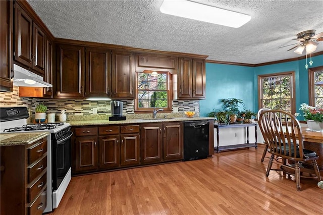 kitchen with dishwasher, crown molding, sink, light hardwood / wood-style flooring, and gas range gas stove