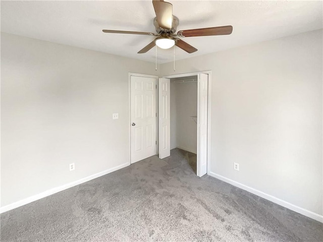 unfurnished bedroom with a closet, carpet floors, and ceiling fan