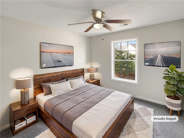 carpeted bedroom with ceiling fan