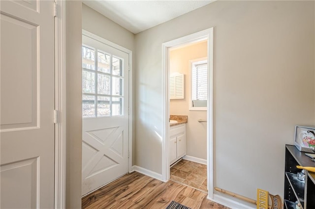 200 Villa Rd Unit 103, Jasper, GA 30143 - doorway with light wood finished floors and baseboards