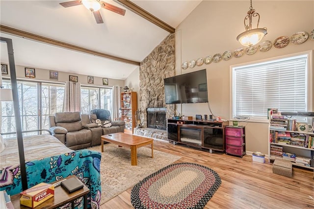 200 Villa Rd Unit 103, Jasper, GA 30143 - living room featuring wood finished floors, ceiling fan, high vaulted ceiling, beamed ceiling, and a fireplace