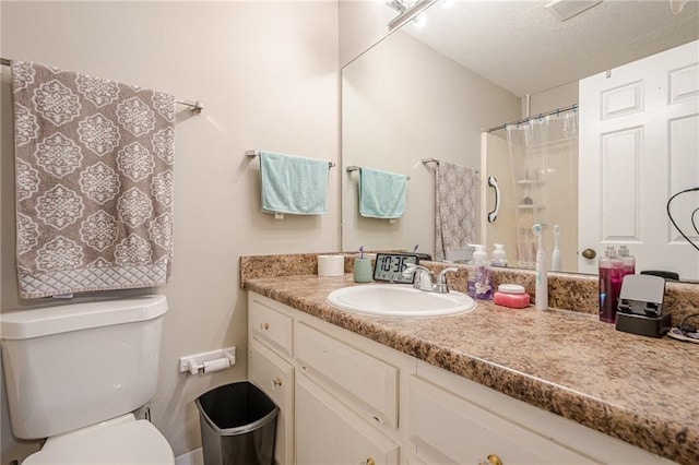 200 Villa Rd Unit 103, Jasper, GA 30143 - bathroom featuring vanity, toilet, a textured ceiling, and curtained shower