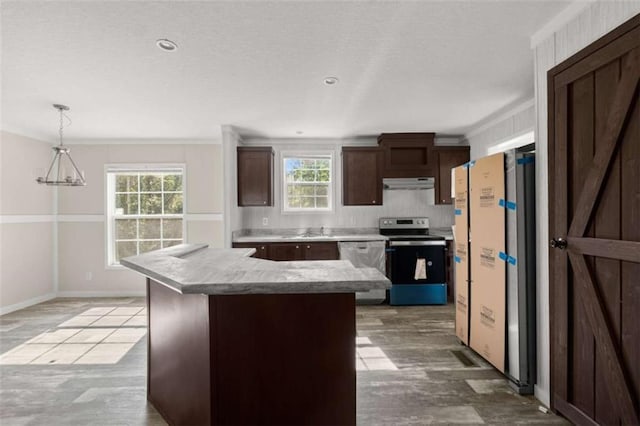 kitchen with dishwasher, stainless steel electric stove, white refrigerator, sink, and decorative light fixtures