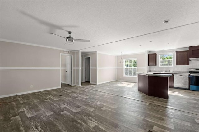 unfurnished living room with hardwood / wood-style floors, a textured ceiling, and ceiling fan