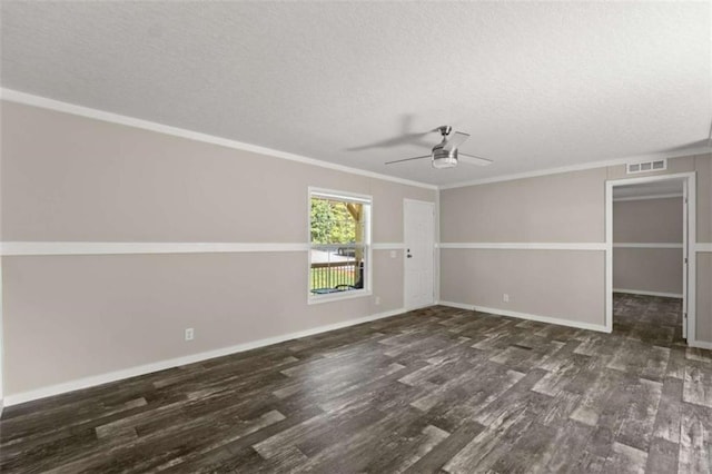 spare room with crown molding, ceiling fan, and dark wood-type flooring