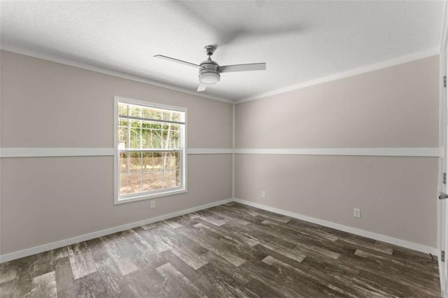 unfurnished room with ornamental molding, ceiling fan, and dark wood-type flooring