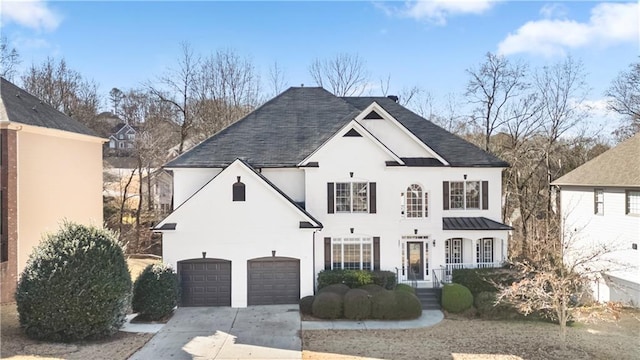 view of front of property with a garage