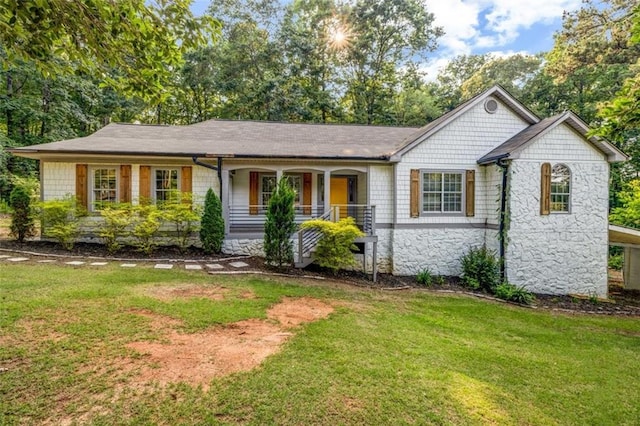 3927 Airline Rd, Mcdonough, GA 30252 - view of front of property with stone siding, covered porch, and a front yard