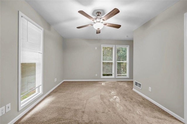 3927 Airline Rd, Mcdonough, GA 30252 - spare room with carpet flooring, a ceiling fan, and baseboards