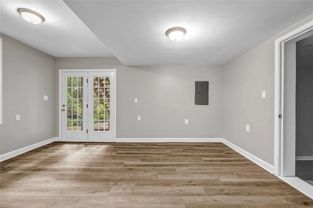 3927 Airline Rd, Mcdonough, GA 30252 - spare room featuring wood finished floors, baseboards, and electric panel