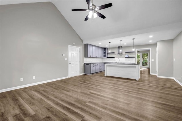 3927 Airline Rd, Mcdonough, GA 30252 - kitchen with open shelves, gray cabinets, open floor plan, a ceiling fan, and backsplash