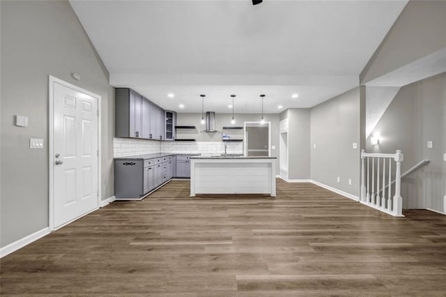 3927 Airline Rd, Mcdonough, GA 30252 - kitchen featuring gray cabinets, exhaust hood, open shelves, lofted ceiling, and dark wood-style flooring