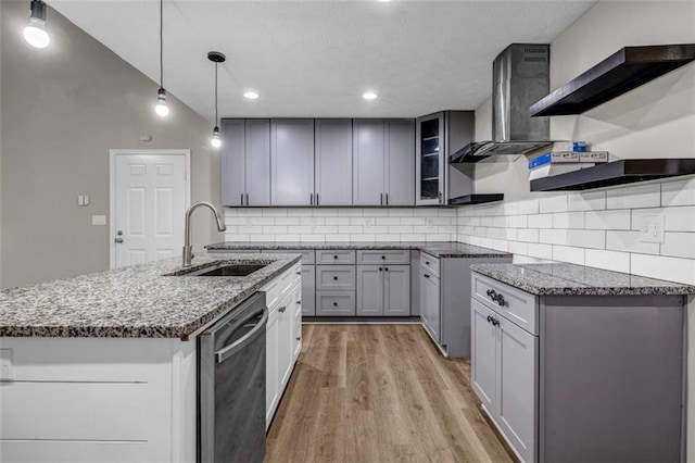3927 Airline Rd, Mcdonough, GA 30252 - kitchen with dishwasher, a sink, wall chimney exhaust hood, stone counters, and light wood finished floors