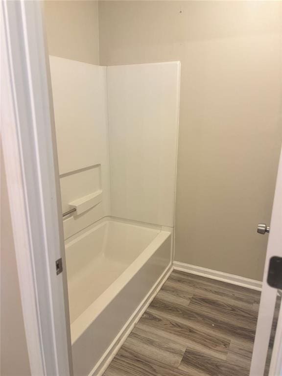 bathroom featuring wood-type flooring