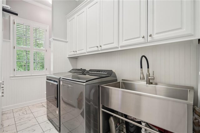 4555 Peachtree Dunwoody Rd, Sandy Springs, GA 30342 - laundry room featuring cabinet space, a sink, marble finish floor, separate washer and dryer, and ornamental molding