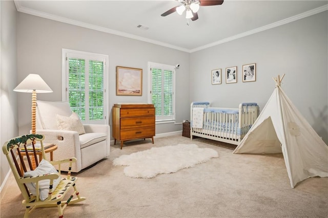 4555 Peachtree Dunwoody Rd, Sandy Springs, GA 30342 - carpeted bedroom featuring visible vents, ornamental molding, baseboards, a nursery area, and a ceiling fan