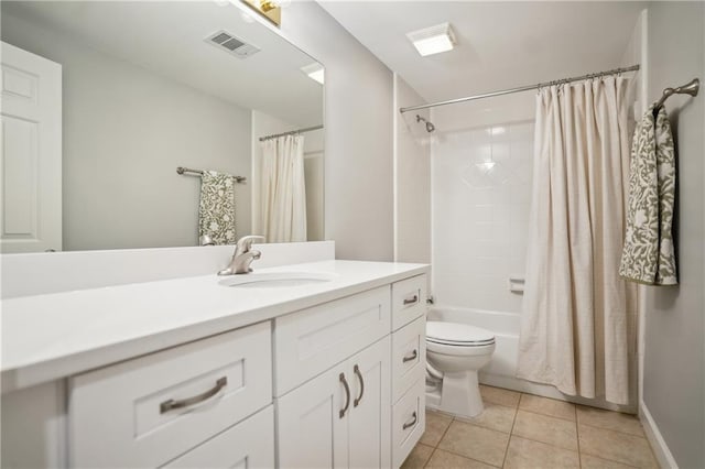 4555 Peachtree Dunwoody Rd, Sandy Springs, GA 30342 - bathroom featuring vanity, toilet, tile patterned floors, shower / bathtub combination with curtain, and visible vents