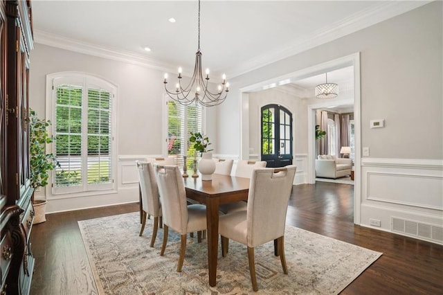 4555 Peachtree Dunwoody Rd, Sandy Springs, GA 30342 - dining space featuring visible vents, crown molding, a chandelier, and a healthy amount of sunlight