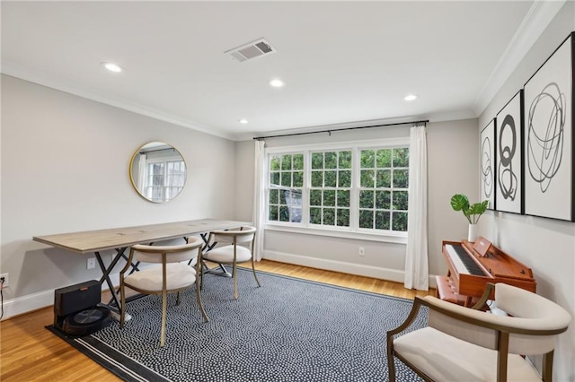 office with wood finished floors, visible vents, baseboards, recessed lighting, and crown molding