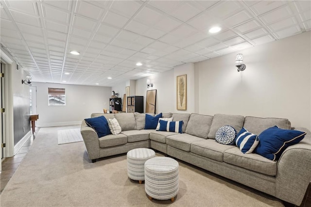 living room featuring recessed lighting and baseboards