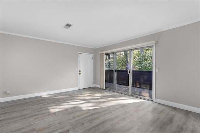 765 Houston Mill Rd NE Unit 7, Atlanta, GA 30329 - empty room with baseboards, wood finished floors, and ornamental molding