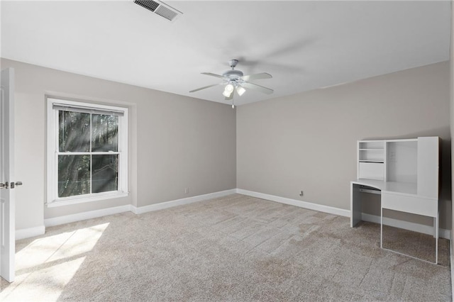765 Houston Mill Rd NE Unit 7, Atlanta, GA 30329 - unfurnished bedroom with carpet flooring, baseboards, and a ceiling fan