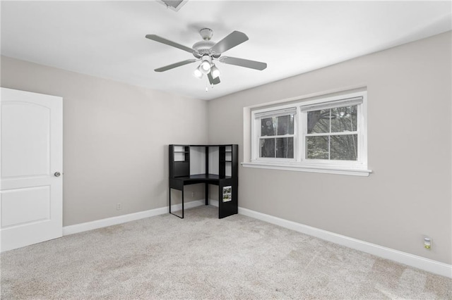 765 Houston Mill Rd NE Unit 7, Atlanta, GA 30329 - unfurnished bedroom featuring carpet floors, baseboards, and a ceiling fan