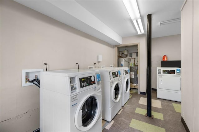 765 Houston Mill Rd NE Unit 7, Atlanta, GA 30329 - communal laundry room with separate washer and dryer, electric water heater, and water heater